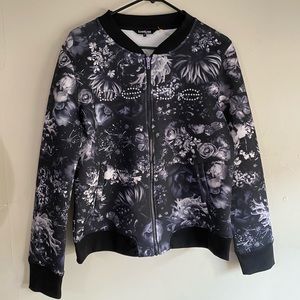 Super cute BEBE floral jacket.